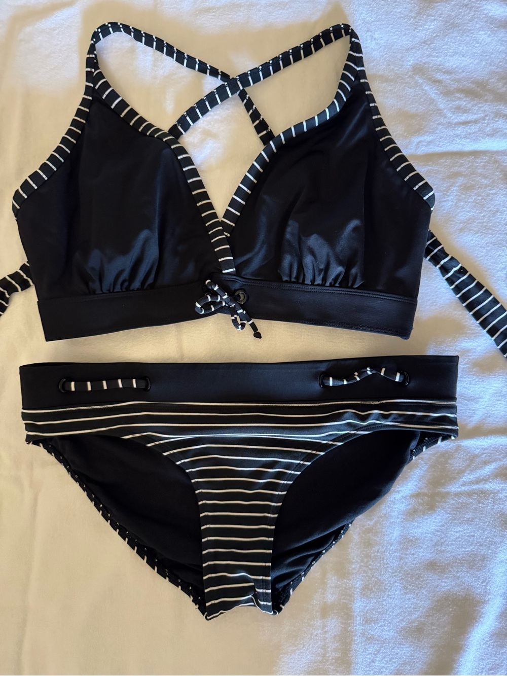 Jag 2 piece swim suit, adjustable straps, tie back.